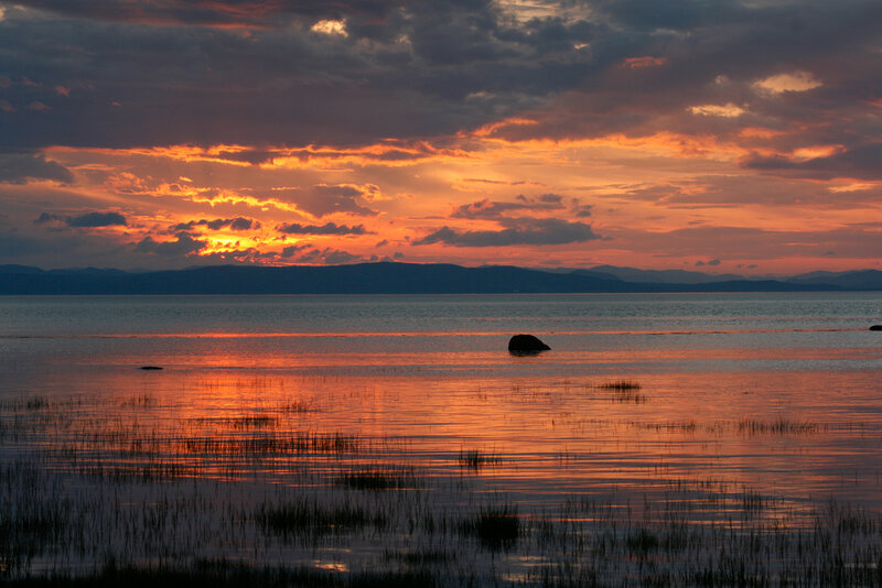 Sunset over Lake — Orange, Serene, Photograph, Mountains, Clouds, Rock