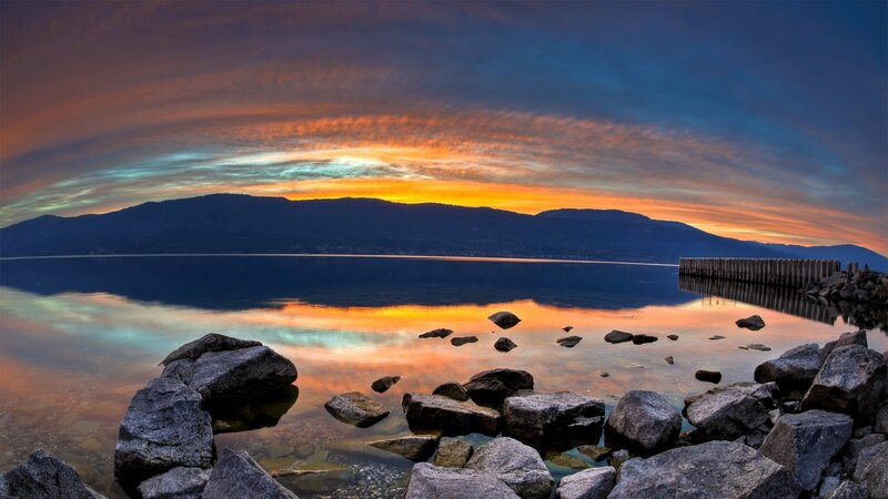Sunset over Lake — Orange, Serene, Photograph, Mountains, Rocks, Pier