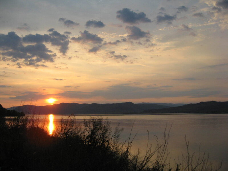 Sunset over Lake — Orange, Serene, Photograph, Mountains, Sky, Plants