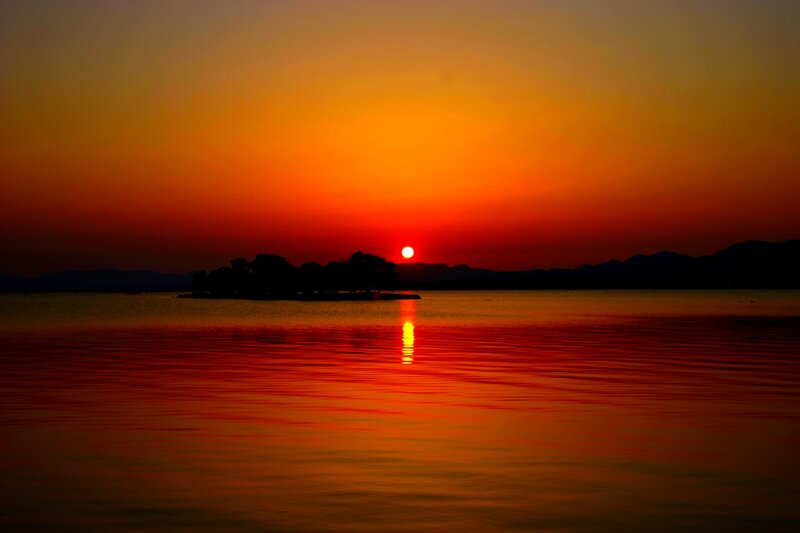 Sunset over Lake — Orange, Serene, Photograph, Sun, Island, Mountains