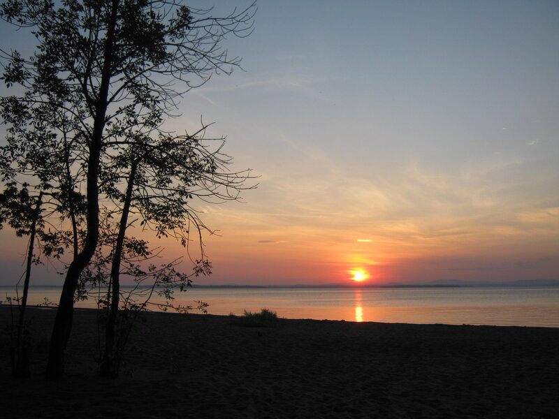 Sunset over Lake — Orange, Serene, Photograph, Tree, Sand