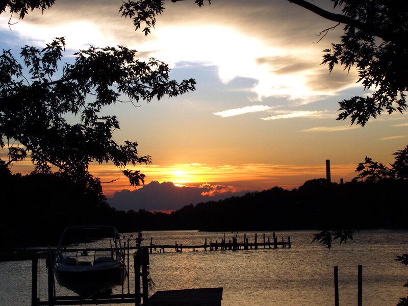 Sunset over Lake — Orange, Serene, Photograph, Trees, Boat, Dock