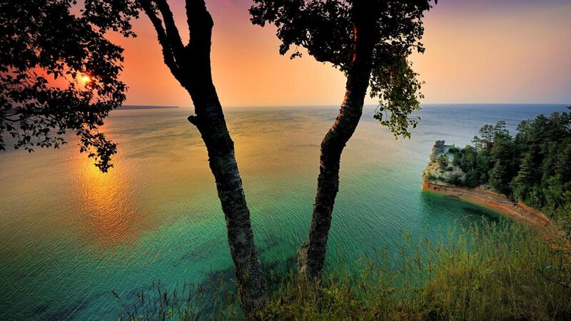 Sunset over Lake — Orange, Serene, Photograph, Trees, Cliff