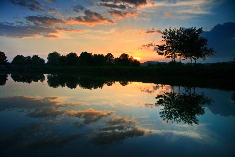 Sunset over Lake — Orange, Serene, Photograph, Trees, Clouds, Mountains