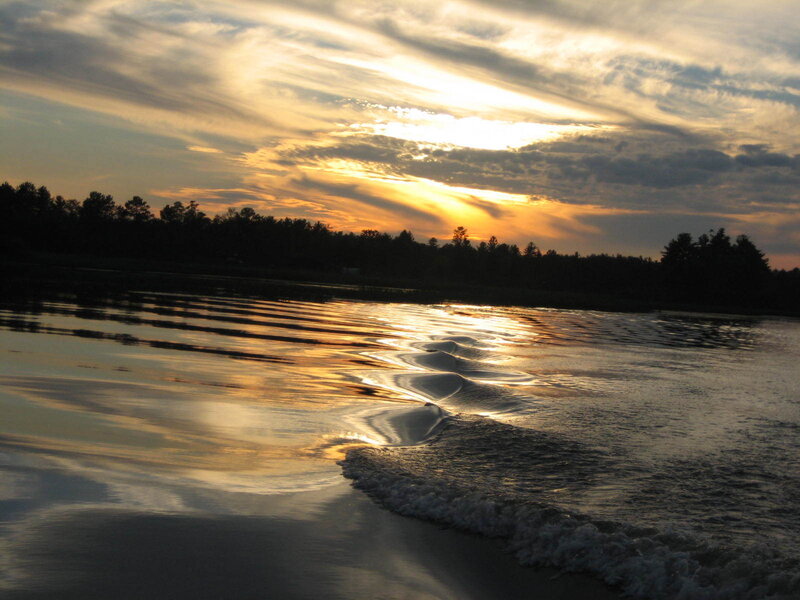 Sunset over Lake — Orange, Serene, Photograph, Trees, Clouds, Waves