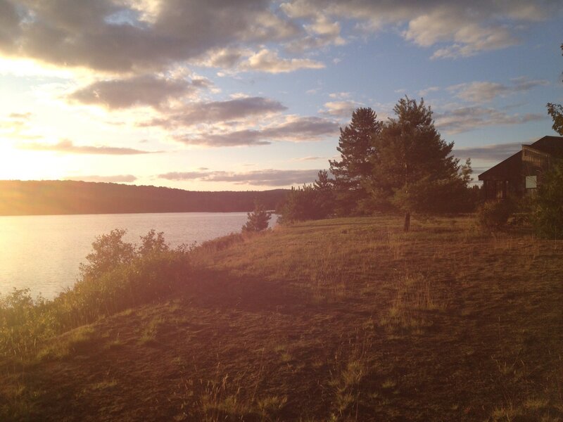 Sunset over Lake — Orange, Serene, Photograph, Trees, House, Clouds