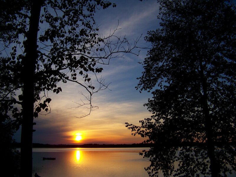 Sunset over Lake — Orange, Serene, Photograph, Trees, Sun, Boat
