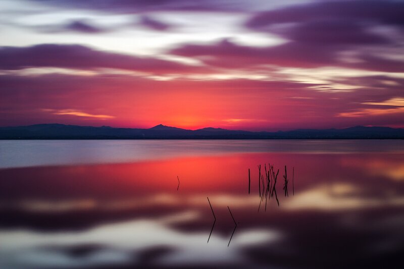 Sunset over Lake — Red, Dramatic, Photograph, Mountains, Sticks