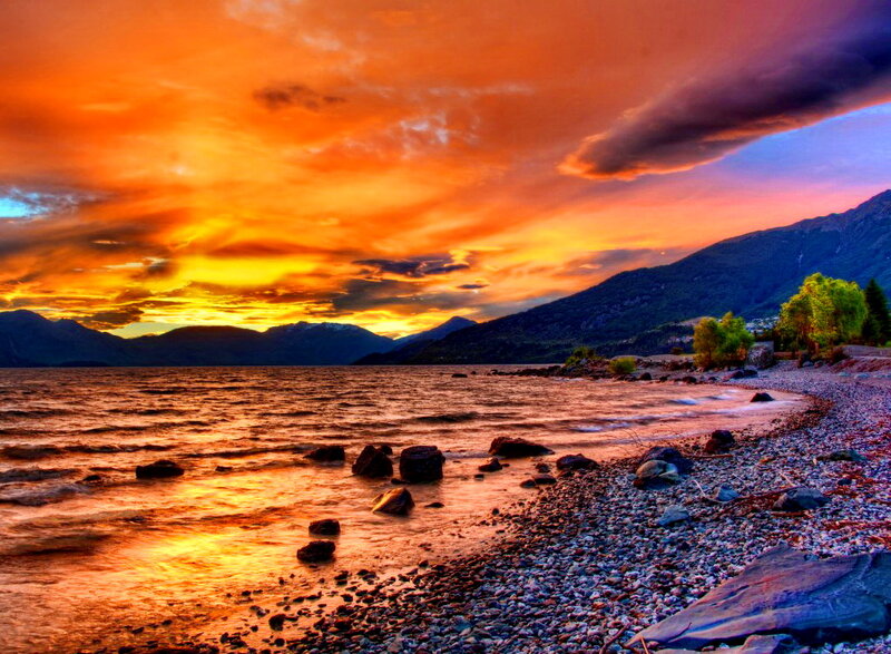Sunset over Lake Shore — Orange, Dramatic, Photograph, Mountains