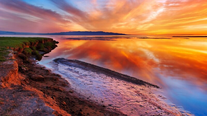 Sunset over Lake Shore — Orange, Dramatic, Photograph, Sky, Water, Mountains, Blue, Green