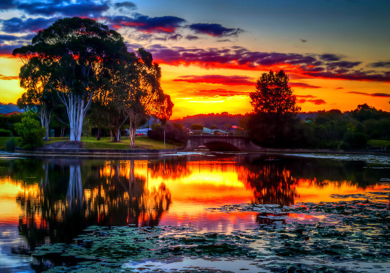 Sunset over Lake with Bridge