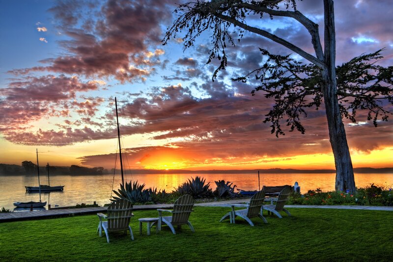 Sunset over Lake with Chairs