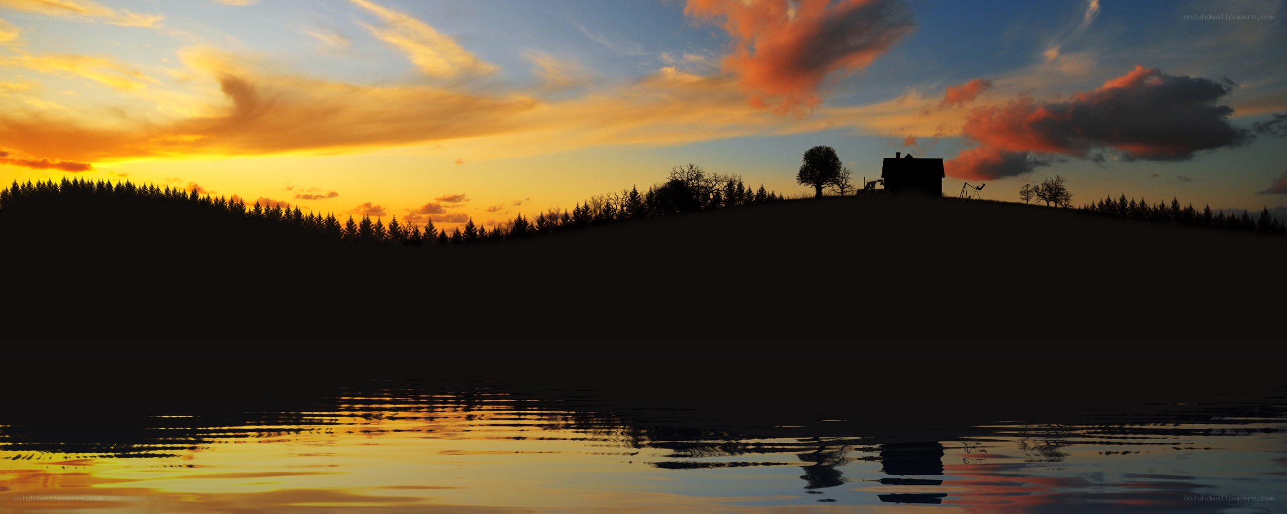 sunset over lakeside cabin