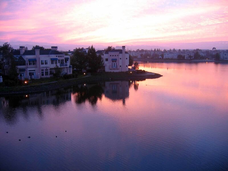 sunset over lakeside homes