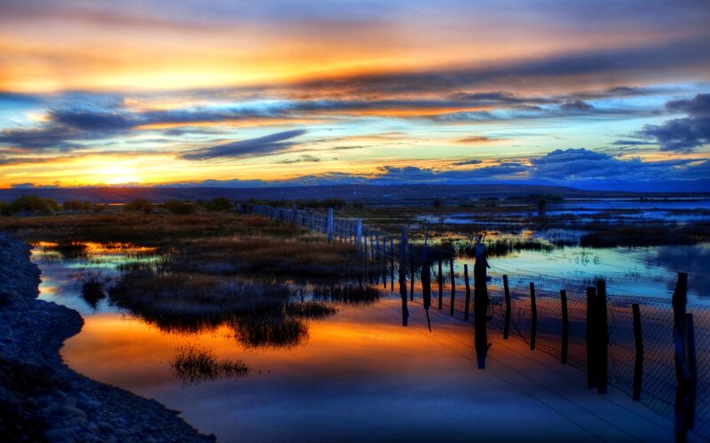 Sunset over Marshland — Orange, Dramatic, Photograph, Fence