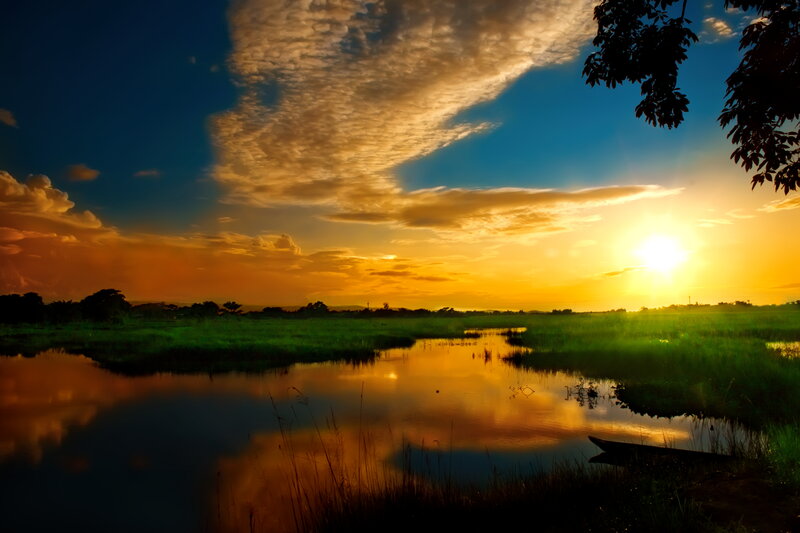 Sunset over Marshland — Orange, Serene, Photograph, Sun