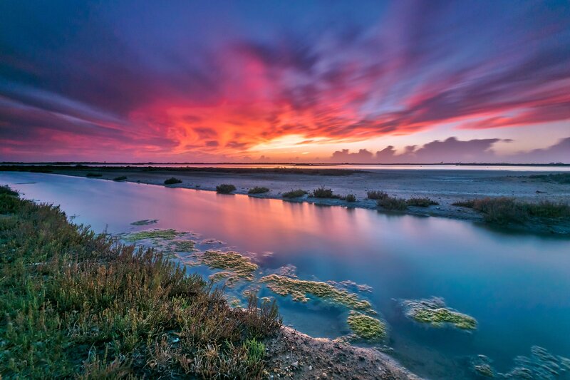 Sunset over Marshland — Red, Dramatic, Photograph