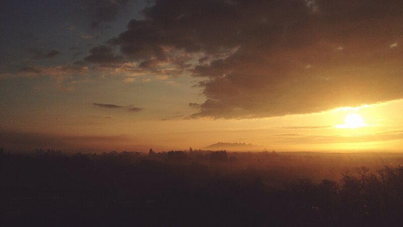 Sunset over Misty Landscape — Orange
