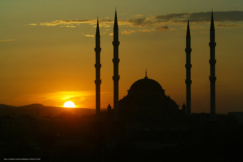 Sunset over mosque silhouette