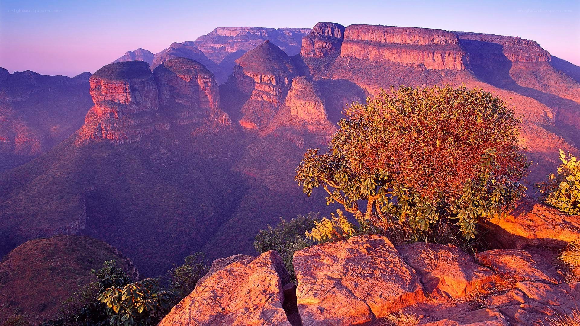 Sunset over mountain cliffs