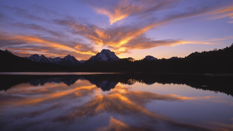 Sunset over mountain lake