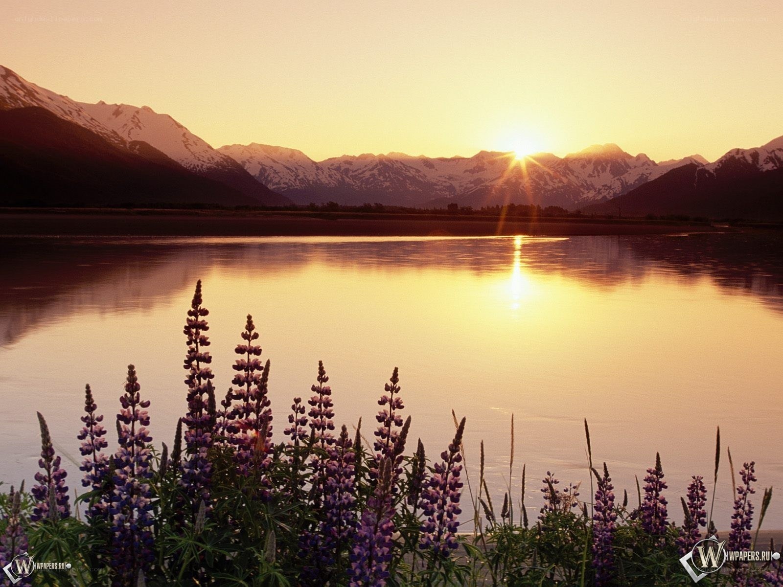 Sunset over mountain lake
