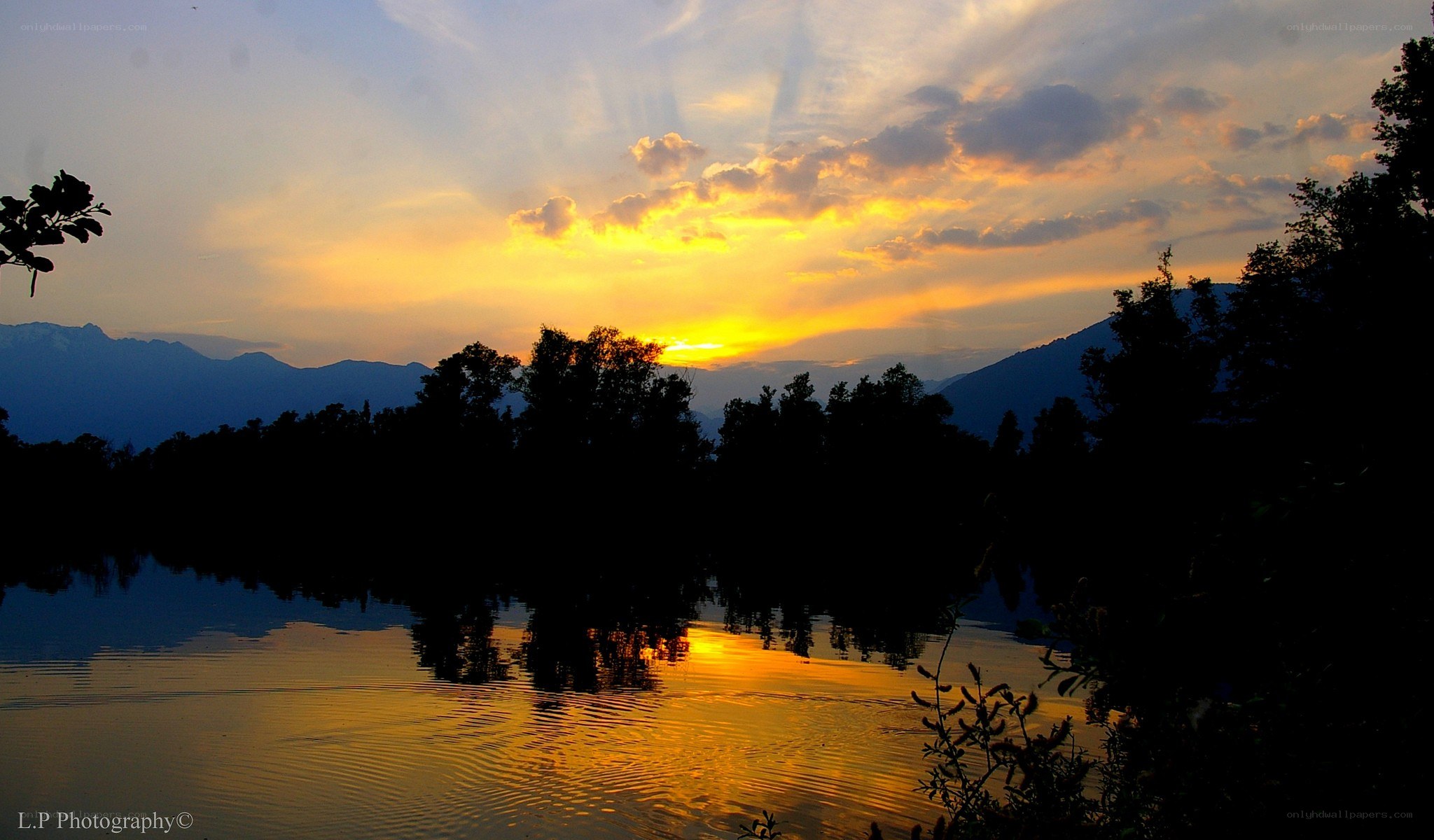 Sunset over mountain lake