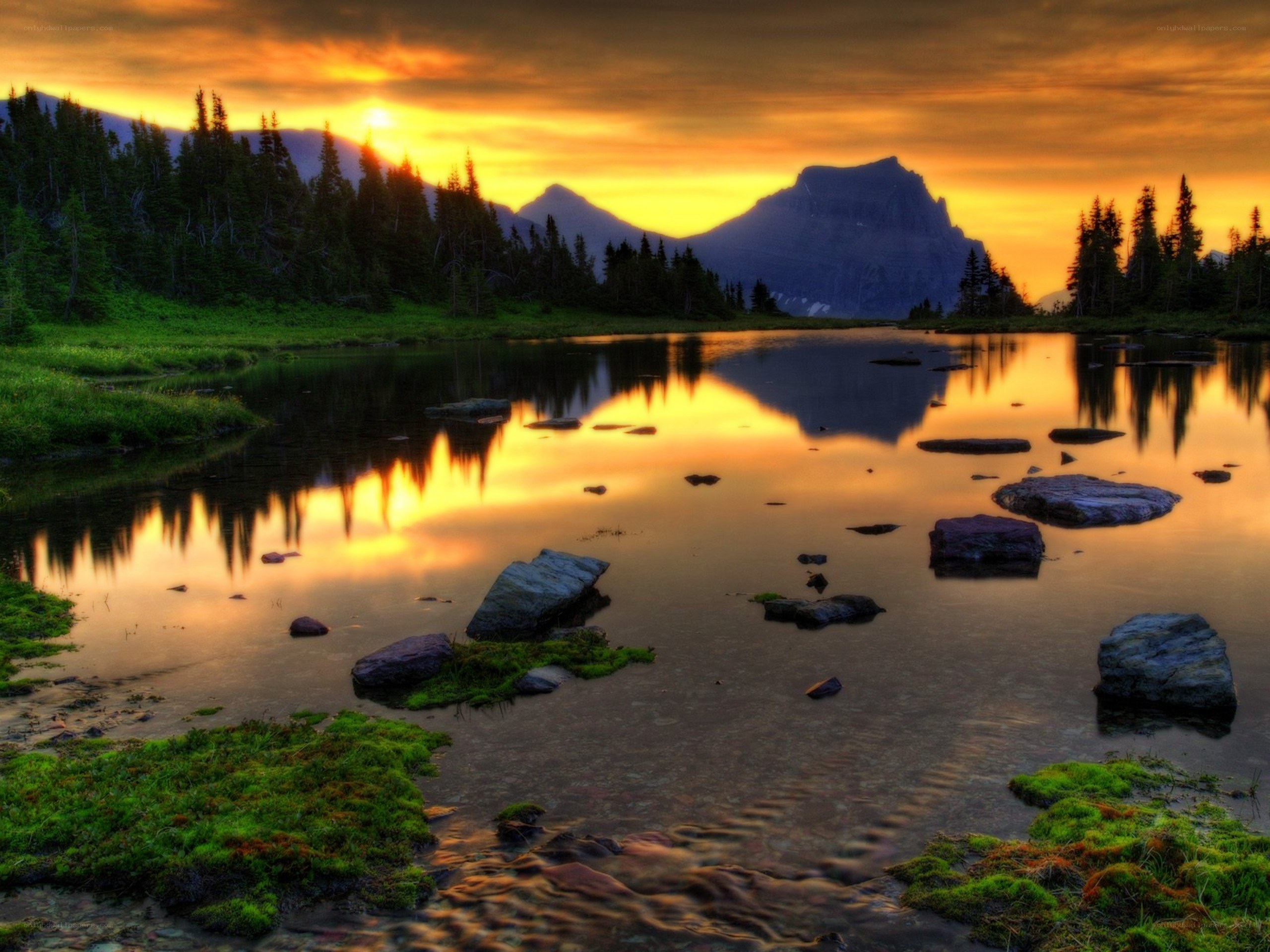 Sunset over mountain lake