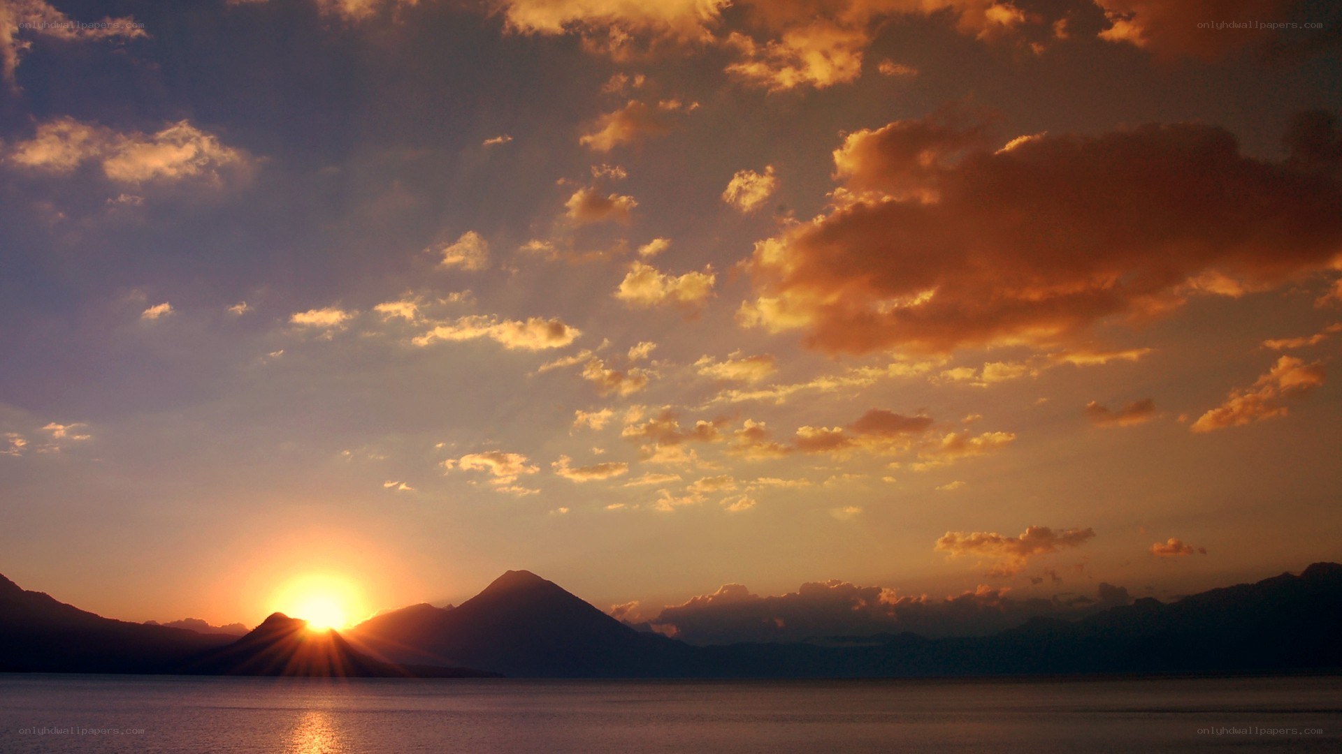 Sunset over mountain lake