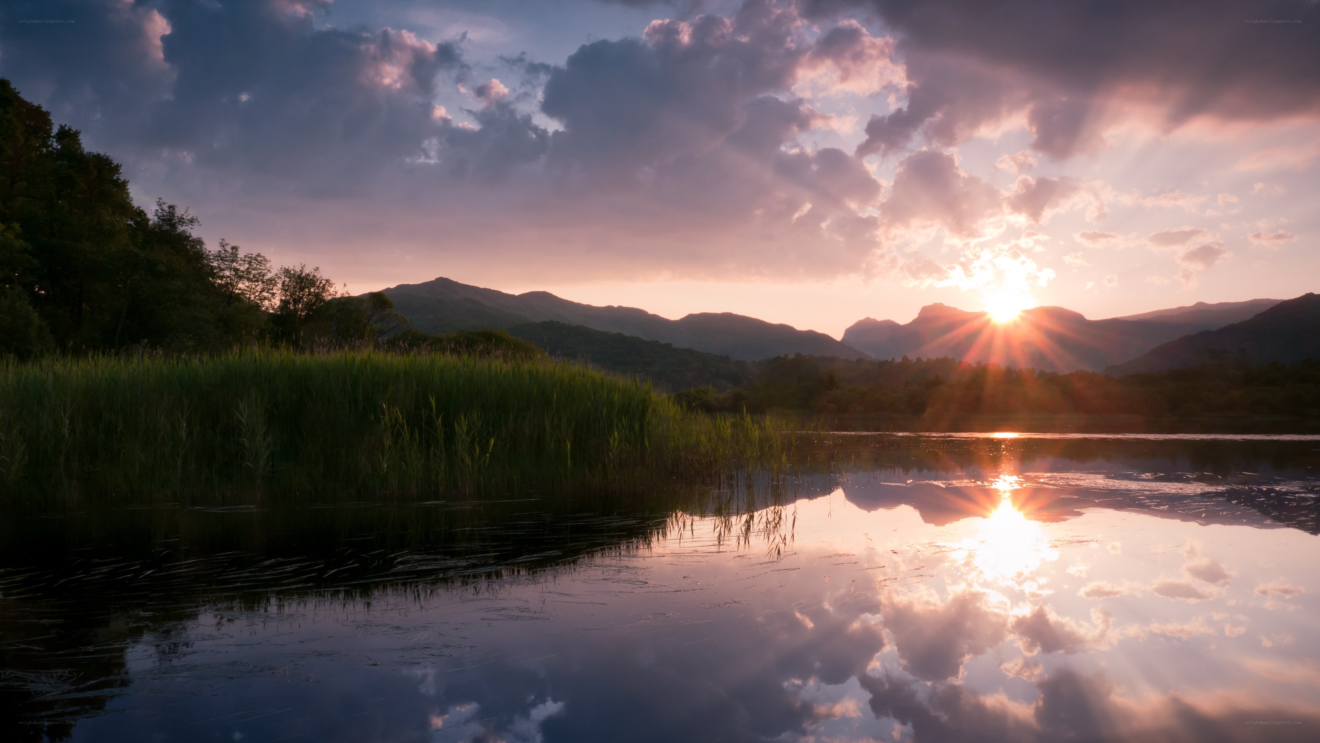 Sunset over mountain lake