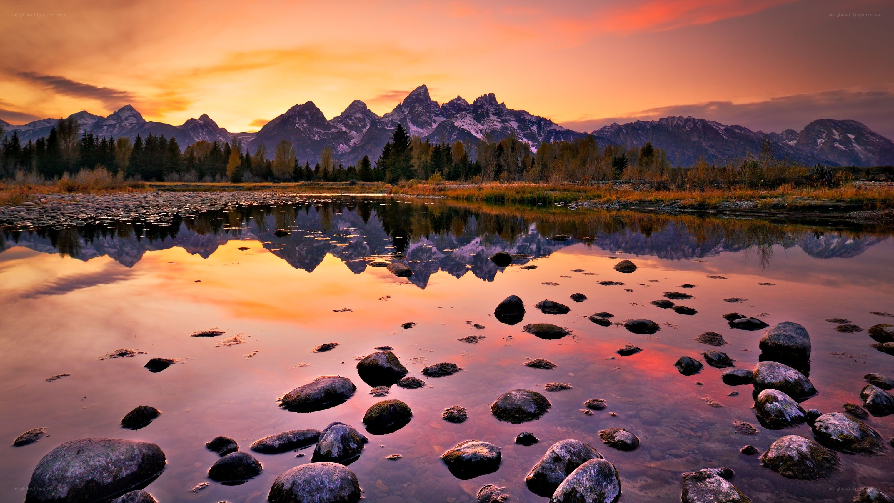 sunset over mountain lake