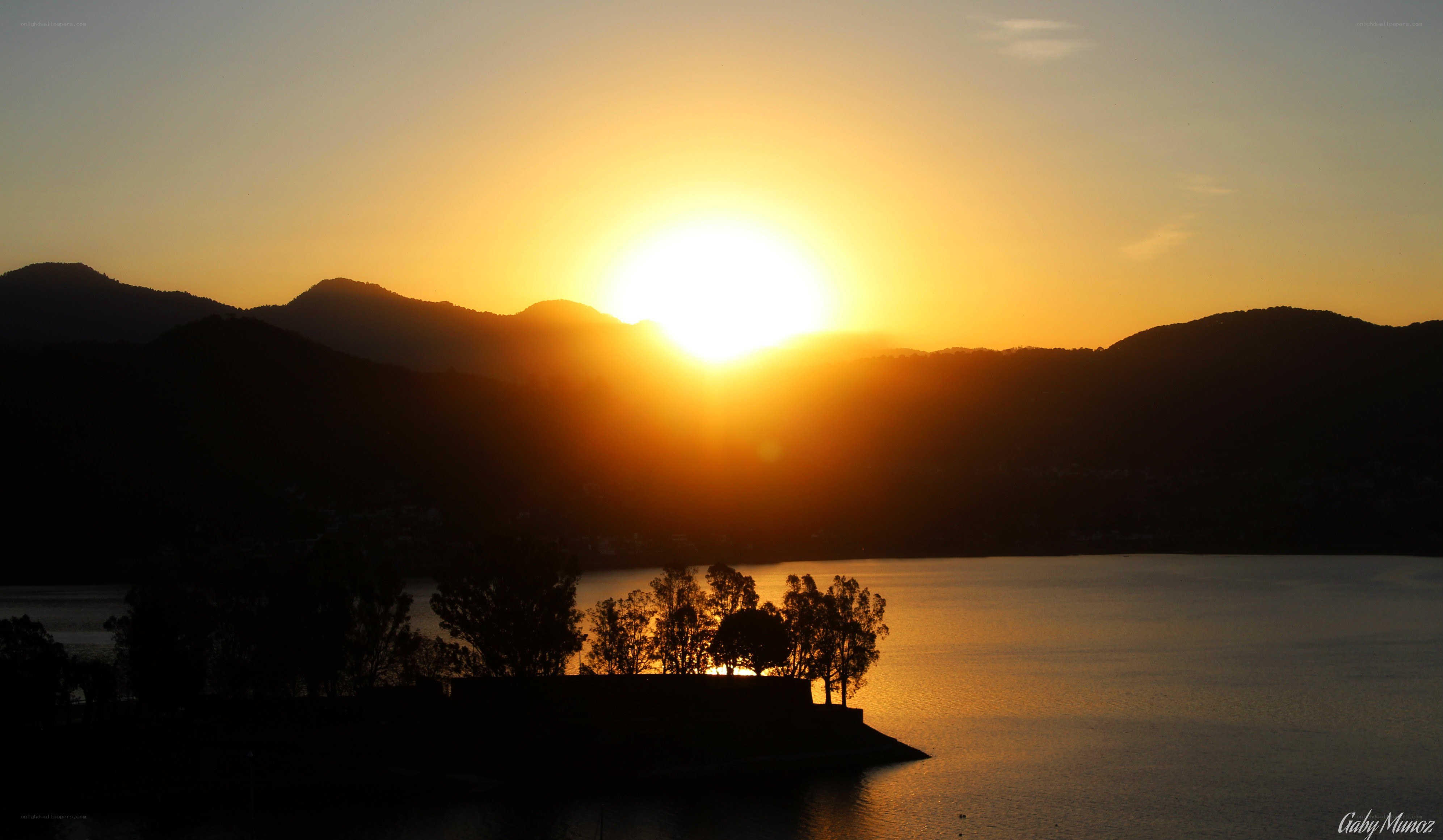 Sunset over mountain lake
