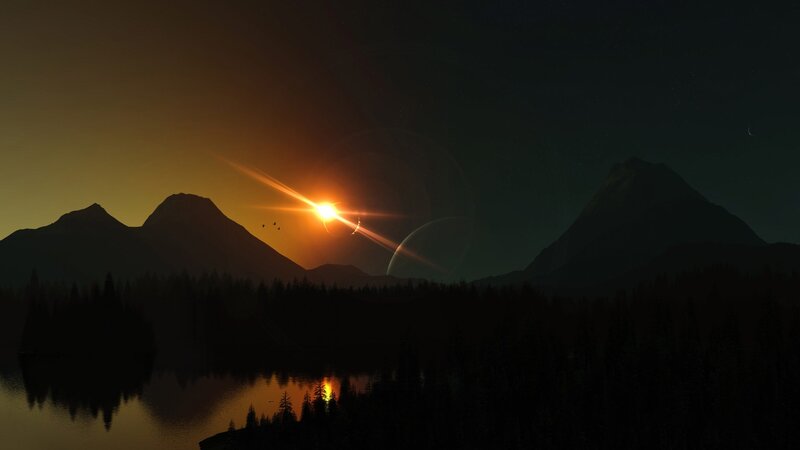 sunset over mountain lake