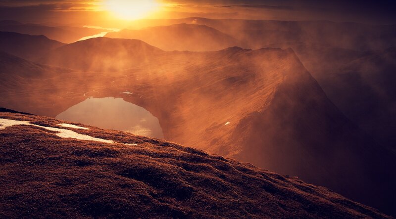 Sunset over mountain lake