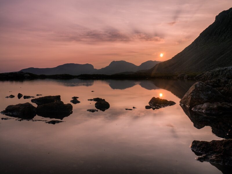 Sunset over mountain lake