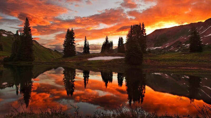 Sunset over mountain lake