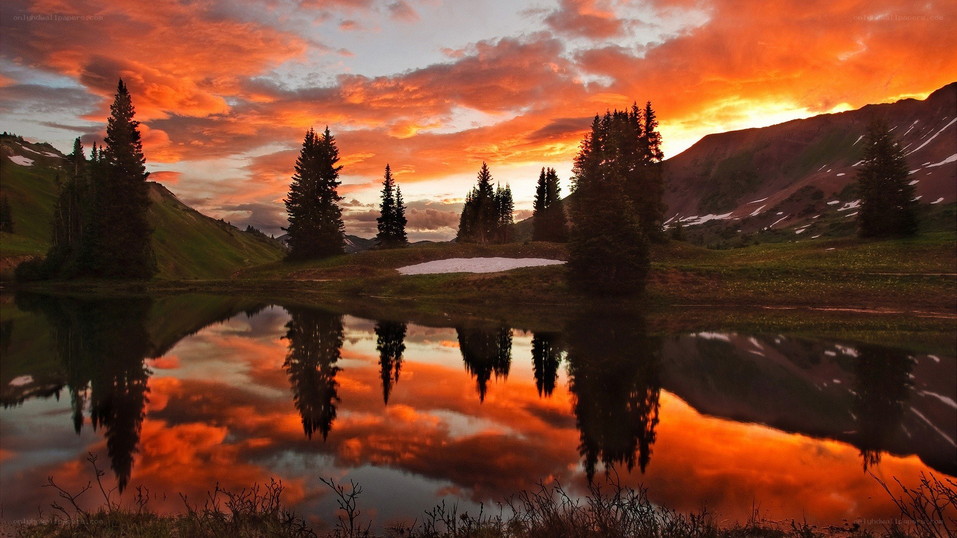 Sunset over mountain lake