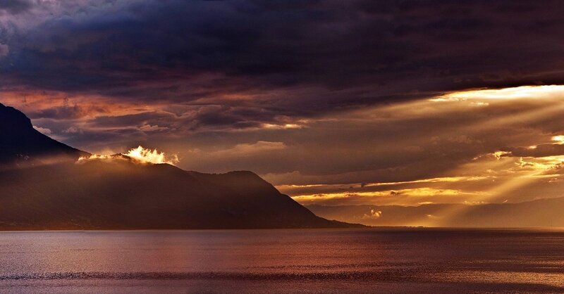 Sunset over mountain lake