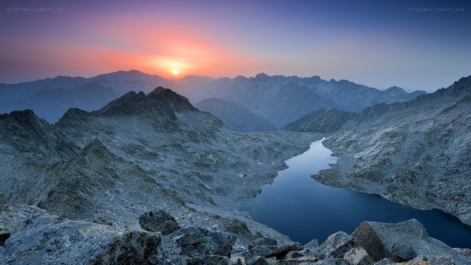 Sunset over mountain lake
