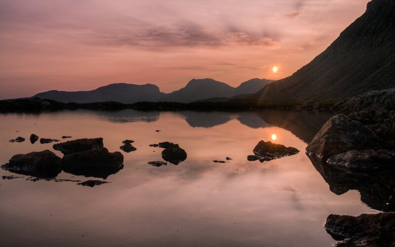 Sunset over mountain lake