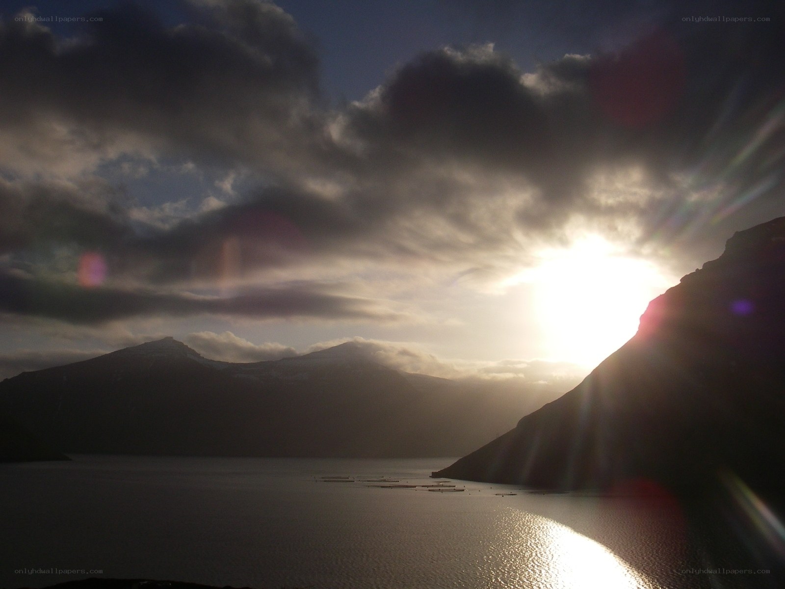 Sunset over mountain lake