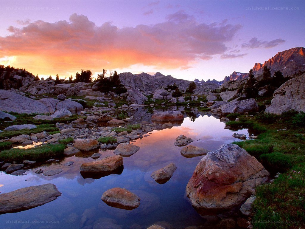 Sunset over mountain lake