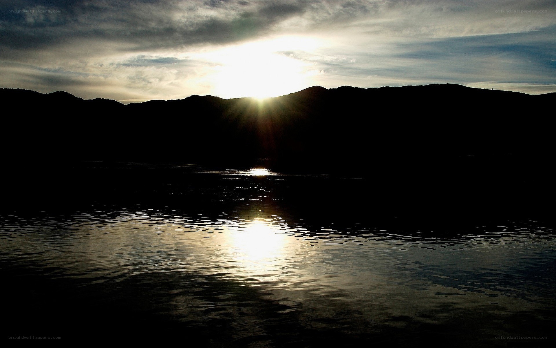Sunset over mountain lake