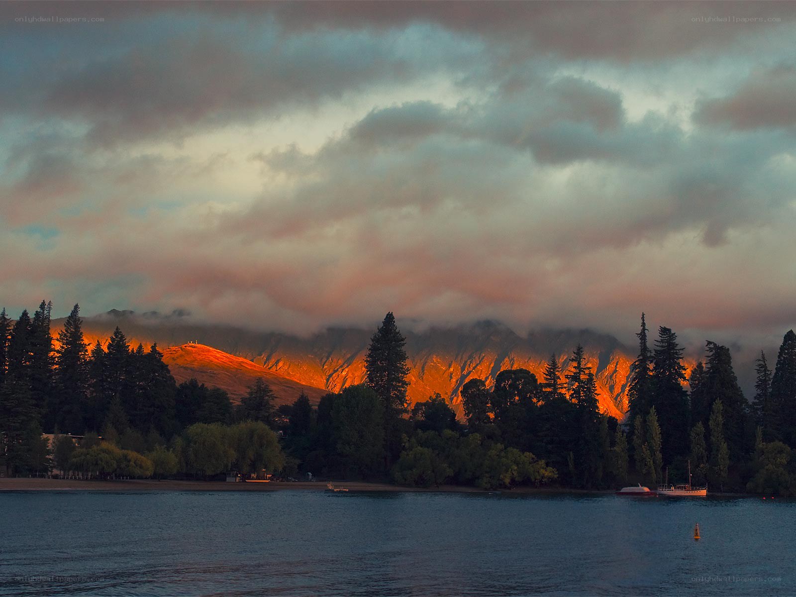 Sunset over mountain lake