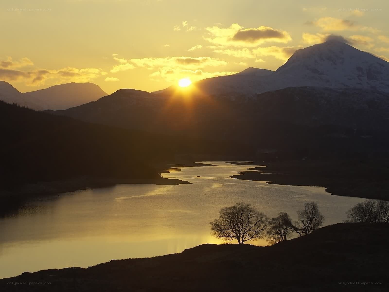 Sunset over mountain lake