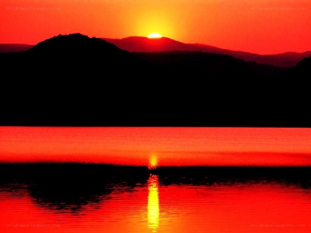 Sunset over mountain lake