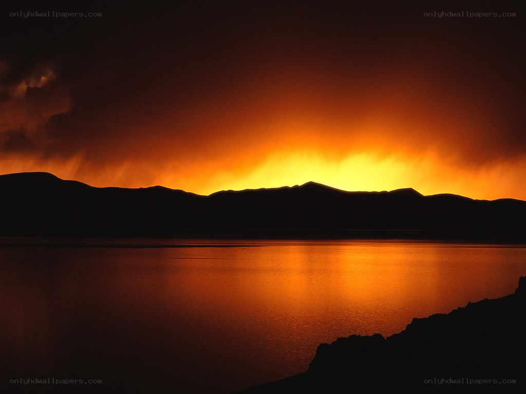 Sunset over mountain lake