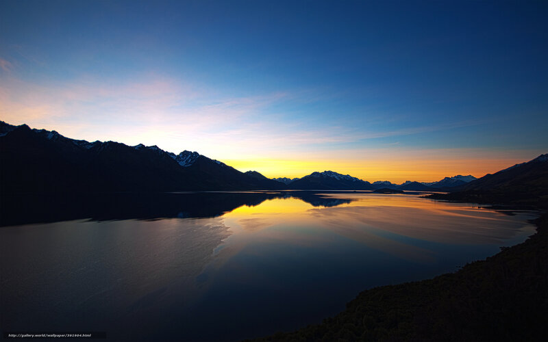 Sunset over mountain lake