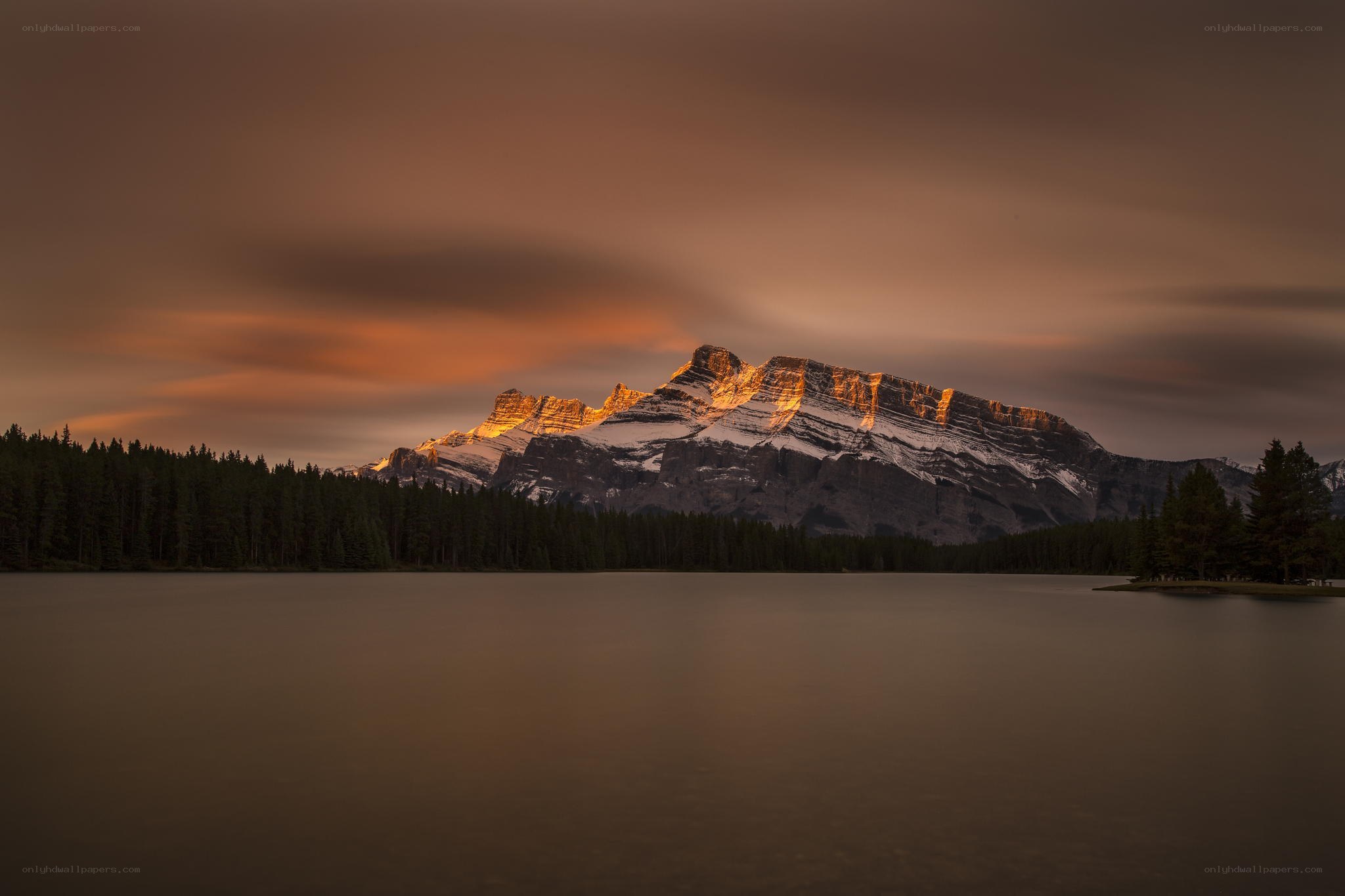 Sunset over mountain lake