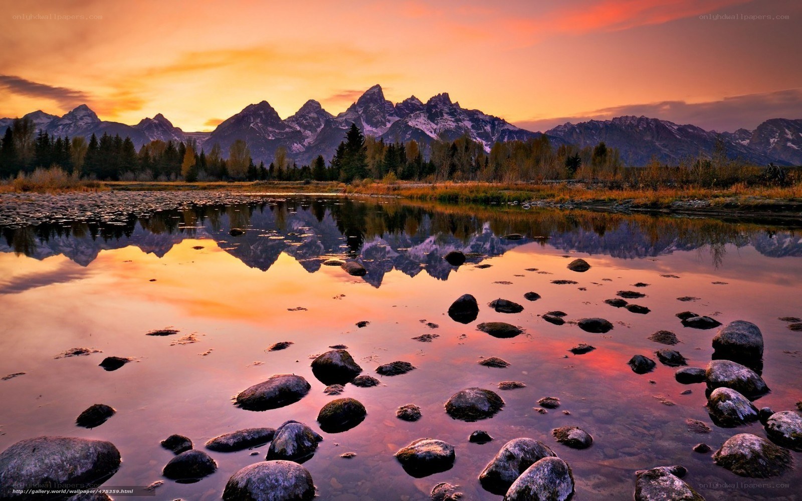 Sunset over mountain lake